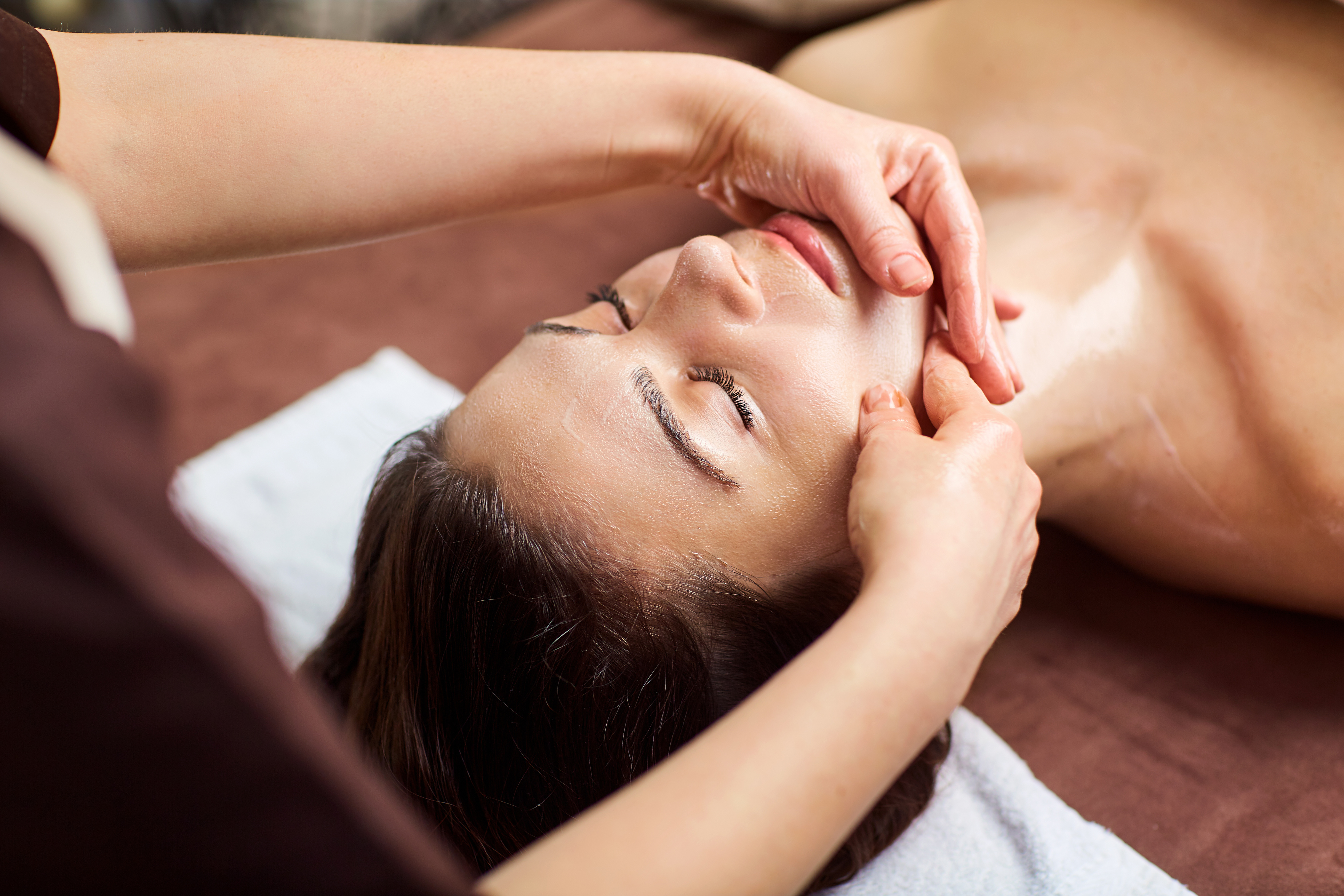 Beautiful Woman Having a Facial Massage